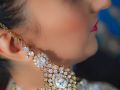 Sona's earing detail by Resh Rall Wedding Photography, Leeds