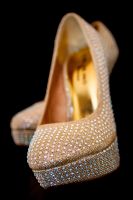 Sona's pair of wedding shoes detail by Resh Rall Wedding Photography, Leeds