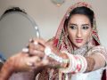 Sona's with mirror by Resh Rall Wedding Photography, Leeds