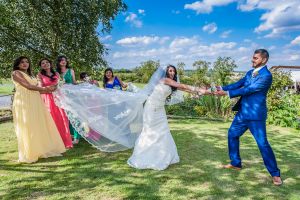 Bride groom and bridesmaids by Resh Rall