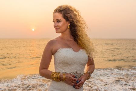 Resh Rall Photographs Abigail in bridal dress by the beach in India